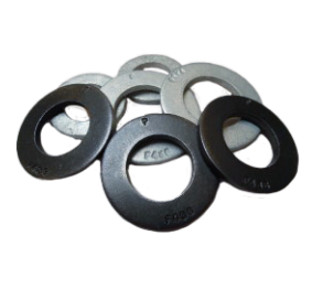 A group of flat, round metal washers in different shades, with a central hole and some markings on their surfaces.