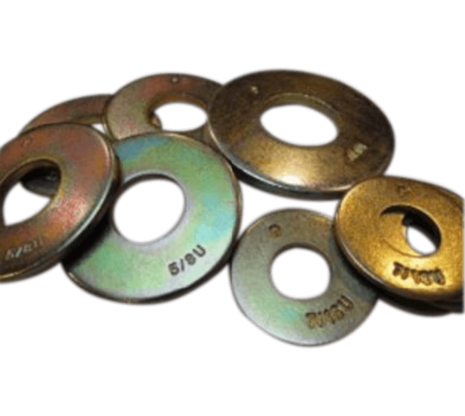 A group of metal washers with varying diameters arranged overlapping each other on a plain background.
