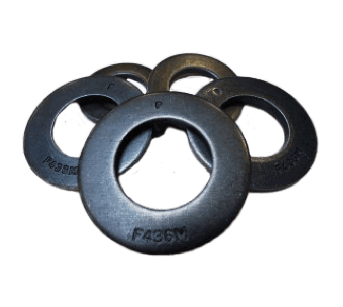 Four black metal washers labeled "F436M" are stacked and overlapping each other.